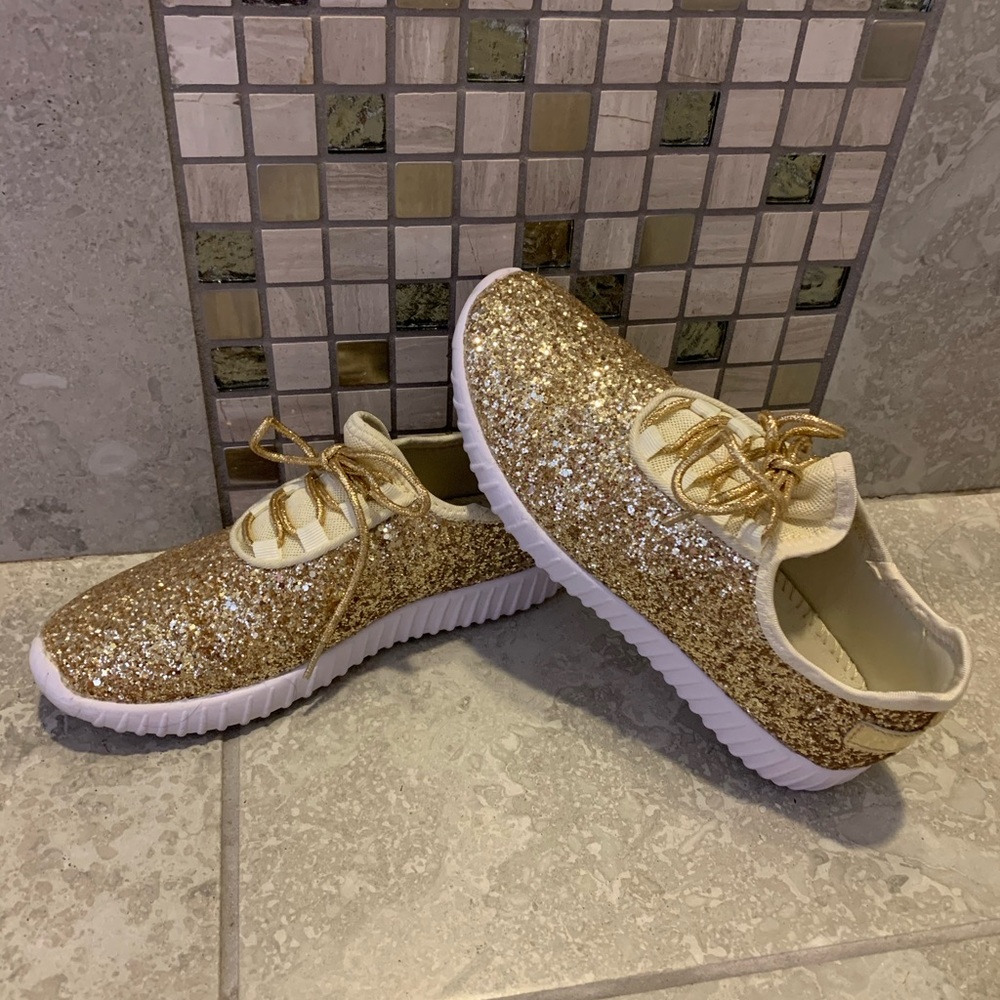 Women’s gold sneakers